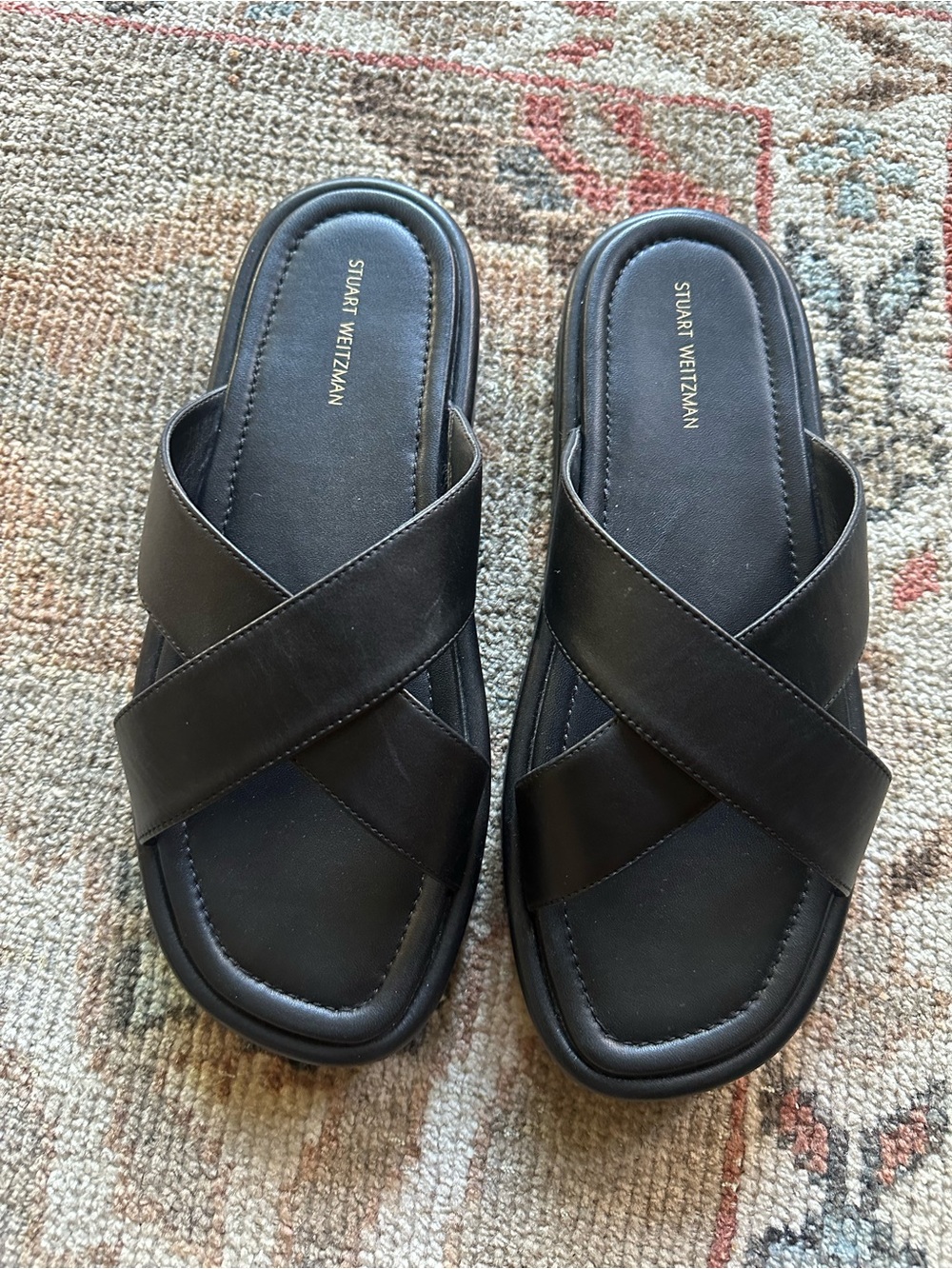 Stuart Weitzman women Black Leather Cross-Band Slide Sandals
Size 39 or 8.5